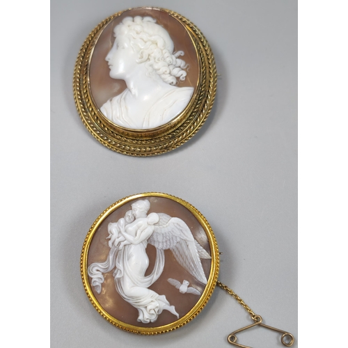 77 - Two gold Victorian cameo brooches of circular and oval form, one depicting Aurora Goddess of Dawn, t... 