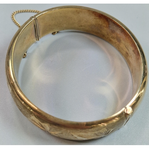 84A - 9ct gold engraved ladies bangle. 6.5cm diameter approx. 30g approx. (B.P. 21% + VAT)