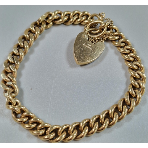 88 - 9ct gold curb-link bracelet with heart shaped padlock. 17cm long approx. 25.5g approx.  (B.P. 21% + ... 