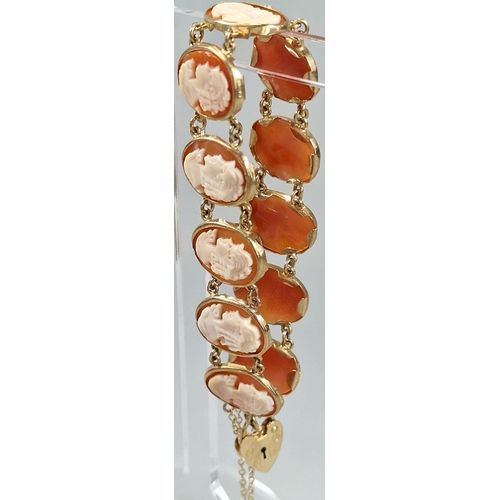 88A - 9ct gold cameo portrait bracelet with heart padlock. 14.3g approx. (B.P. 21% + VAT)