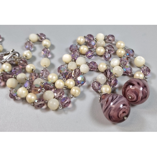 94 - Christian Dior beaded necklace with two pear shaped glass pendants. 100cm long approx. In lined box ... 