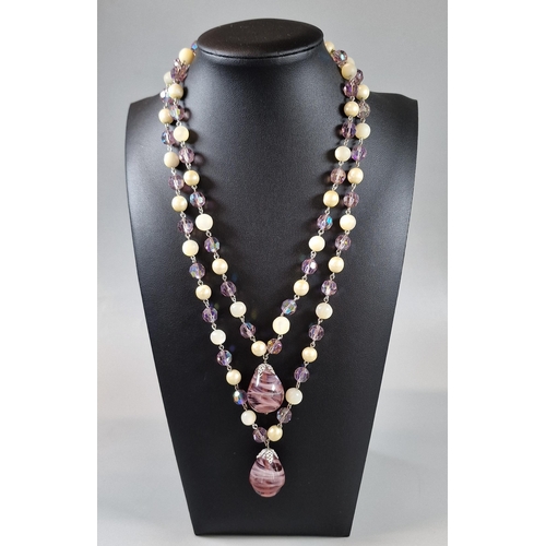 94 - Christian Dior beaded necklace with two pear shaped glass pendants. 100cm long approx. In lined box ... 