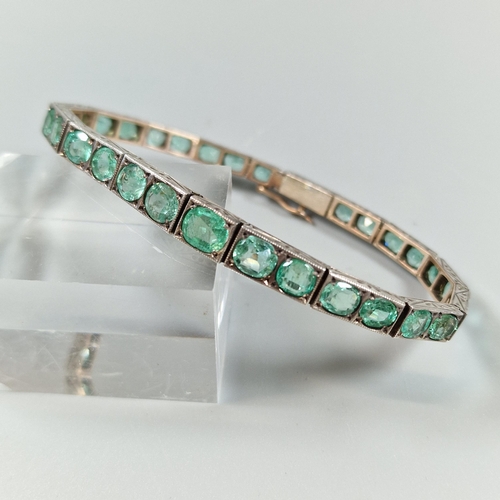 96 - White gold bracelet set with thirty two emeralds.  19cm long approx. 15.2g approx. Natural grade - A... 