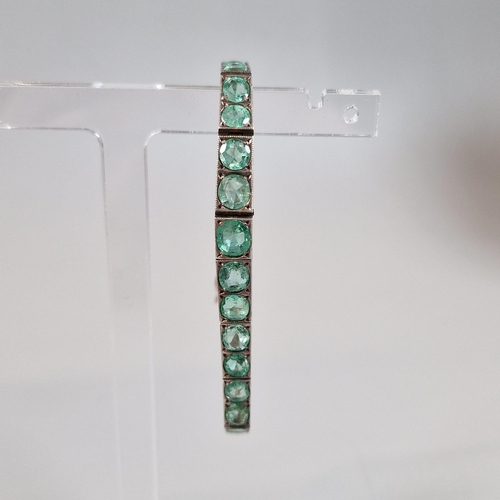 96 - White gold bracelet set with thirty two emeralds.  19cm long approx. 15.2g approx. Natural grade - A... 