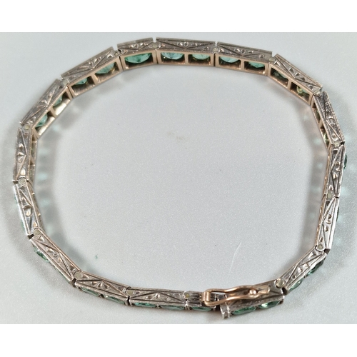 96 - White gold bracelet set with thirty two emeralds.  19cm long approx. 15.2g approx. Natural grade - A... 