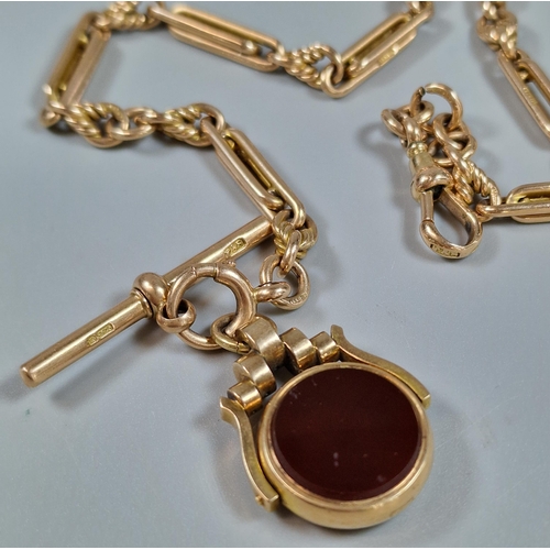 97 - Early 20th century 15ct gold T Bar Albert watch chain with bloodstone and hardstone revolving fob. 4... 