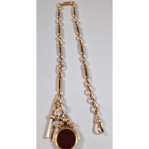 97 - Early 20th century 15ct gold T Bar Albert watch chain with bloodstone and hardstone revolving fob. 4... 