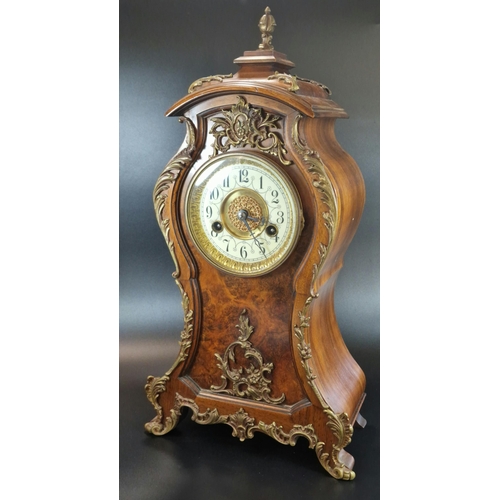 9A - 20th century French design mahogany balloon shaped boudoir clock, having gilt metal mounts to the ca... 