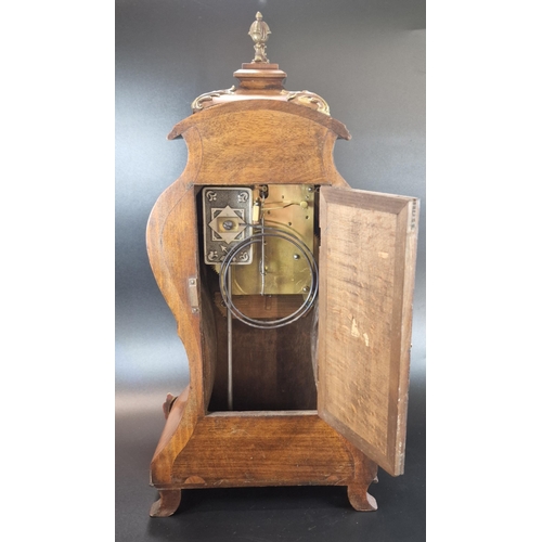 9A - 20th century French design mahogany balloon shaped boudoir clock, having gilt metal mounts to the ca... 