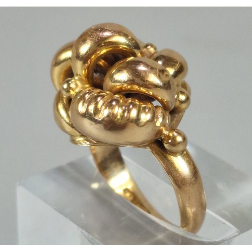 62 - 18ct gold weave design ring. 9.4g approx. Size M. (B.P. 21% + VAT)