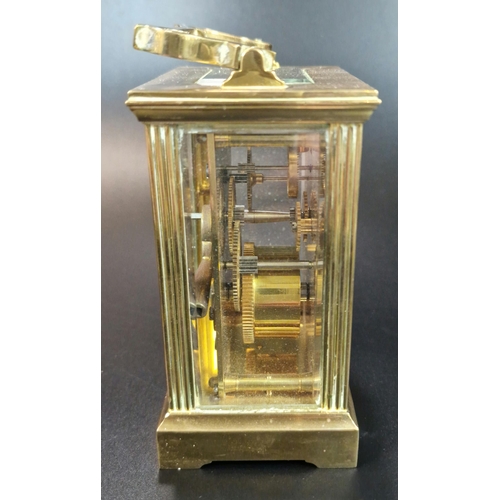 11 - French brass carriage clock, having fluted gorge case and full depth Roman face marked 'Swansea Gold... 