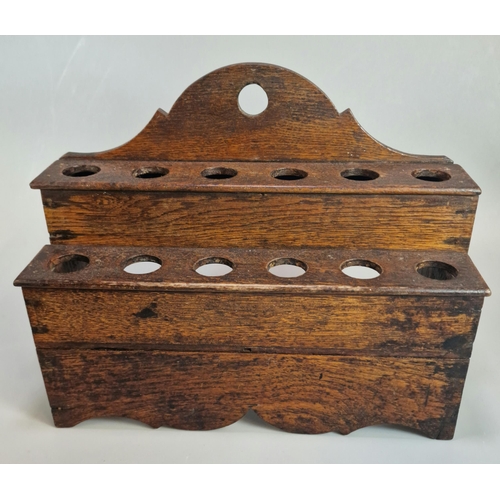 324 - 19th century Welsh oak traditional twelve section spoon rack with shaped frieze together with a late... 