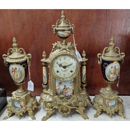 109 - 20th century brass French style clock garniture with Arabic face, figural panels and two vase shaped... 