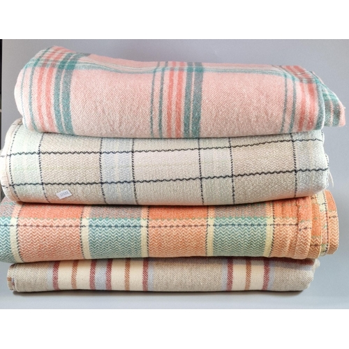 170 - Four Welsh checked blankets in various colourways. (4)  (B.P. 21% + VAT)