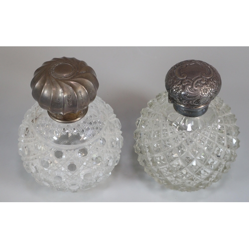 213 - Two similar Edwardian hobnail cut globular scent bottles with silver lids. (2) (B.P. 21% + VAT)