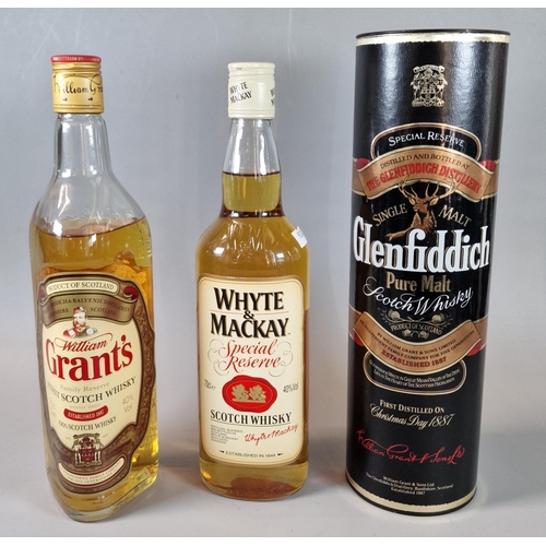 22 - Three bottles of Whisky to include: William Grant's 70cl., Whyte and MacKay Special Reserve 70cl. an... 