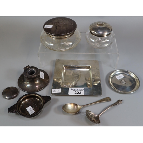 223 - Box of silver items to include: capstan inkwell, glass dressing table jars with silver covers, squar... 