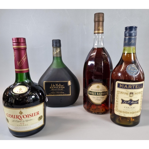 23 - Four bottles of Brandy/Cognac to include: Courvoisier 70cl., Martel V S 68cl., Three Barrels Reserve... 