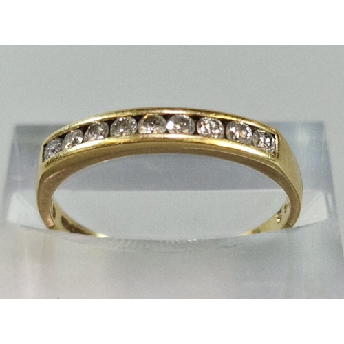 233 - 18ct gold nine stone diamond half eternity ring. 2g approx. Size N. (B.P. 21% + VAT)