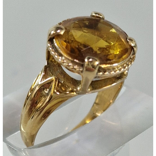 237 - Yellow metal and orange stone dress ring. 4.7g approx. Size N. (B.P. 21% + VAT)