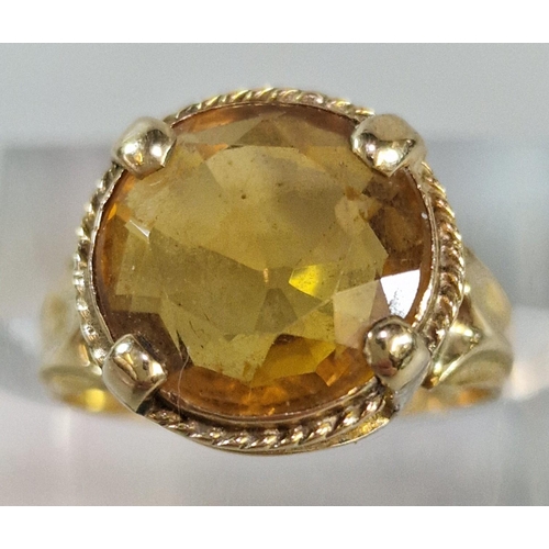 237 - Yellow metal and orange stone dress ring. 4.7g approx. Size N. (B.P. 21% + VAT)