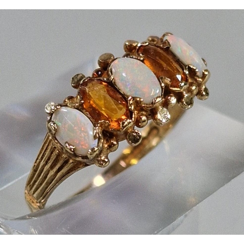 238 - 9ct gold orange and opal five stone ring. 1.7g approx. Size L1/2. (B.P. 21% + VAT)