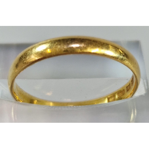 239 - 22ct gold wedding band. 2.6g approx. Size O1/2. (B.P. 21% + VAT)