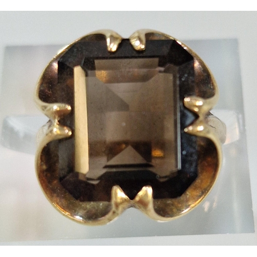 243 - 9ct gold smokey quartz ring. 4.8g approx. Size K.  (B.P. 21% + VAT)