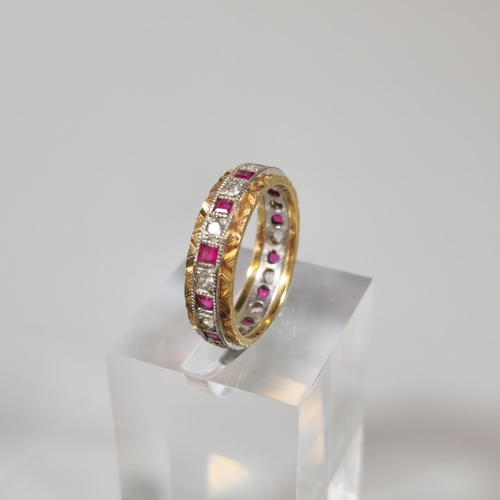 249 - 9ct gold ruby and clear stone eternity style ring. 3.9g approx. Size O. (B.P. 21% + VAT)