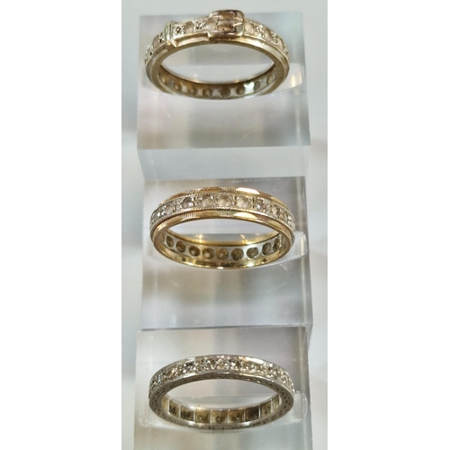 252 - White metal diamond eternity ring. 3g approx. Size K, together with two 9ct gold eternity style ring... 