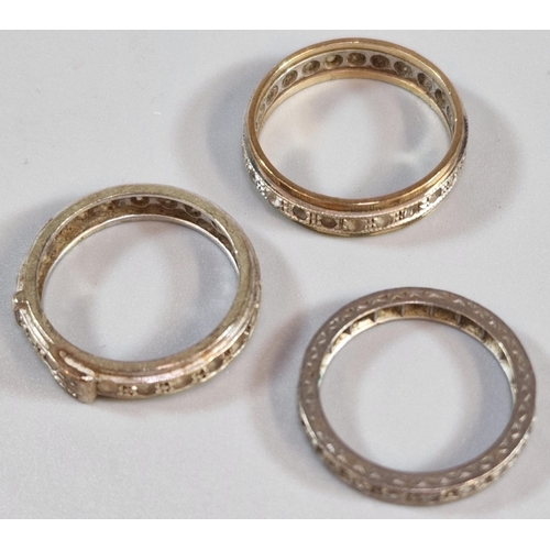 252 - White metal diamond eternity ring. 3g approx. Size K, together with two 9ct gold eternity style ring... 