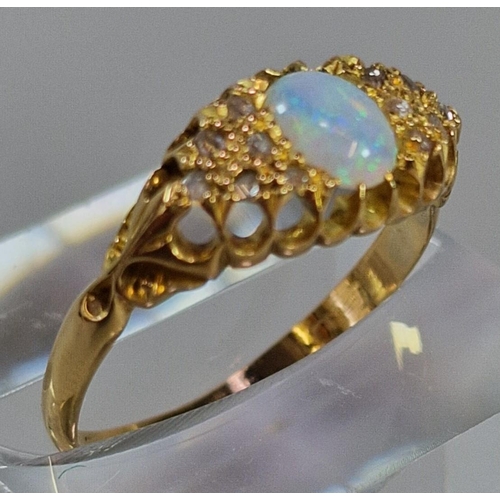 258 - 18ct gold opal cabochon ring inset with tiny diamond chips. 2.4g approx. Size P. (B.P. 21% + VAT)