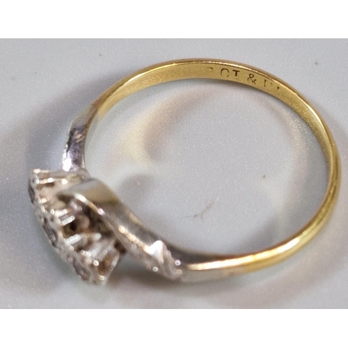 262 - 18ct gold and platinum three stone diamond twist shank ring. 2.6g approx. Size P. (B.P. 21% + VAT)