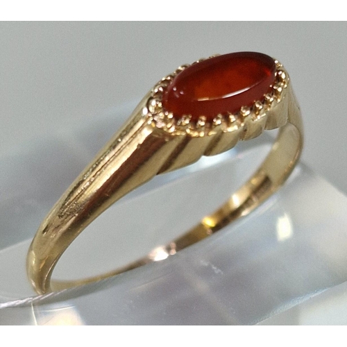 265 - 9ct gold and orange stone ring. 1.6g approx. Size P. (B.P. 21% + VAT)