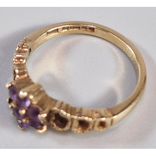 266 - 9ct gold and purple stone flowerhead ring (missing one stone). 2.3g approx. Size J1/2. (B.P. 21% + V... 