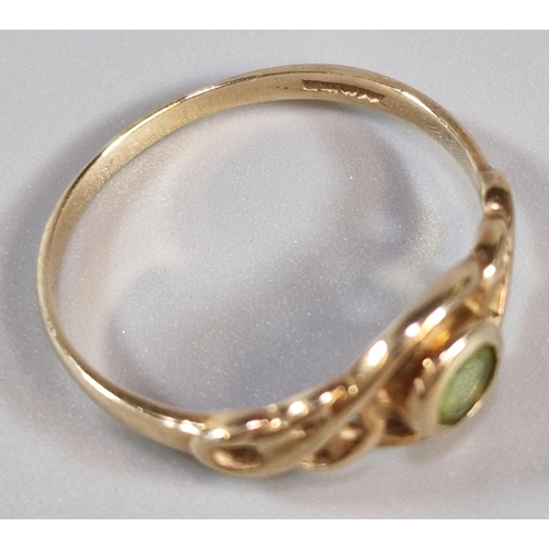 268 - 9ct gold Celtic design peridot ring. 1.4g approx. Size P. (B.P. 21% + VAT)