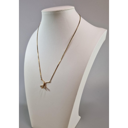 273 - 9ct gold herringbone chain with 3 stone diamond pendant. 4.1g approx. (B.P. 21% + VAT)