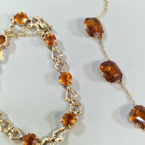 279 - Collection of 9ct gold jewellery to include: orange stone bracelet and a similar necklace. 20.6g app... 