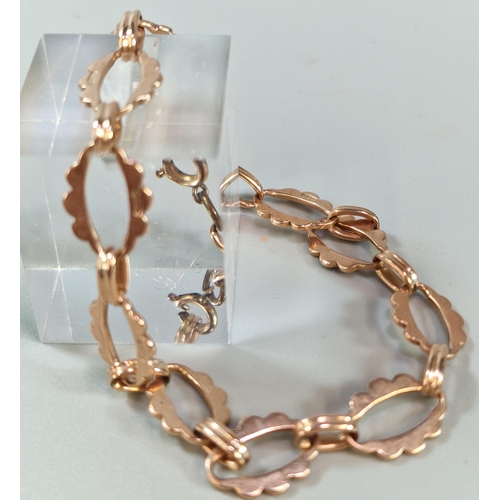 283 - 9ct rose gold bracelet with repeating design. 8.8g approx. (B.P. 21% + VAT)