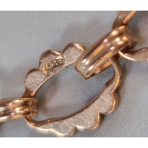 283 - 9ct rose gold bracelet with repeating design. 8.8g approx. (B.P. 21% + VAT)