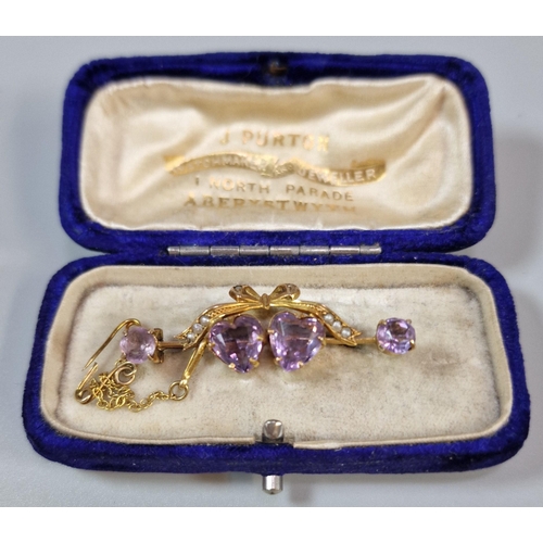 290 - 9ct gold bar brooch, overall with inset seed pearls and purple stone hearts in 'J Purton Watchmaker ... 