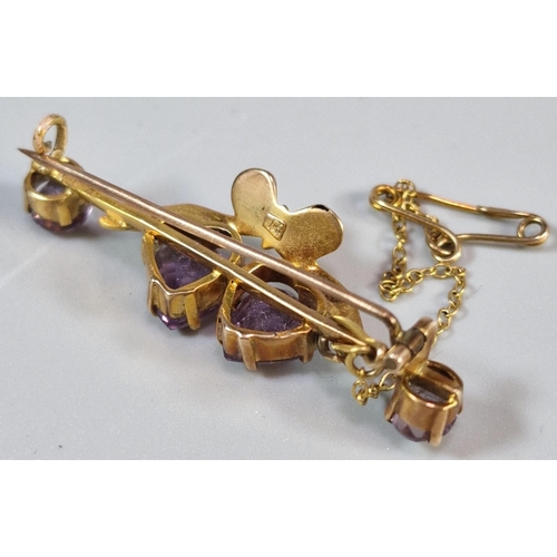 290 - 9ct gold bar brooch, overall with inset seed pearls and purple stone hearts in 'J Purton Watchmaker ... 