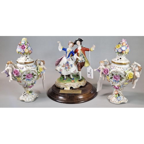 3 - Pair of German porcelain continental two handled vases and covers decorated with cherubs and encrust... 