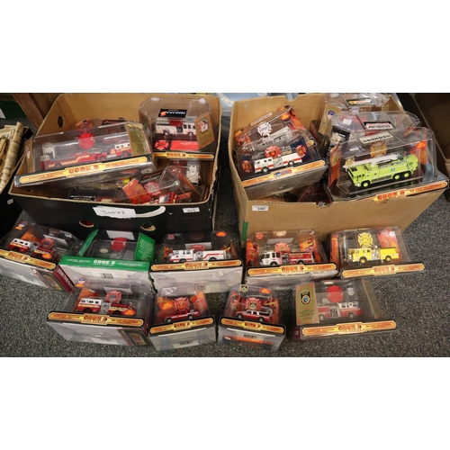 349 - Two boxes of Code 3 diecast limited edition fire engines and similar vehicles in original packaging.... 