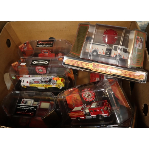 349 - Two boxes of Code 3 diecast limited edition fire engines and similar vehicles in original packaging.... 