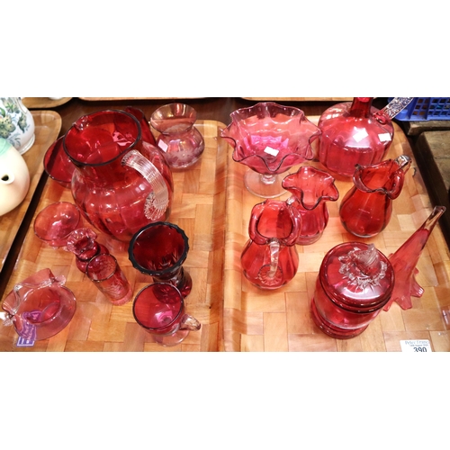 390 - Two trays of Victorian cranberry glass items to include: jugs, decanter, sweetmeat dish etc. (2) (B.... 