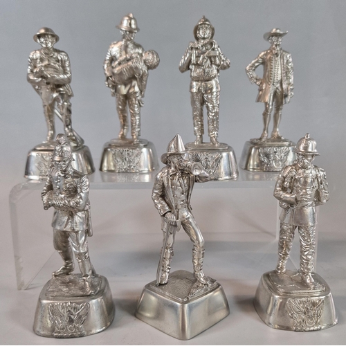 41 - Set of seven pewter figures of Fire Fighters, from various period in various poses. Each 11cm high a... 