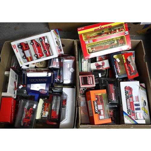 422 - Two boxes comprising assorted diecast Fire Engine and Fire related vehicles, all in original boxes t... 