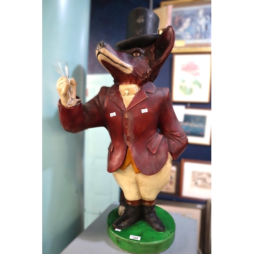 429 - Resin/composition figure of a satirical Fox in hunting costume with toasting glass. 87cm high approx... 