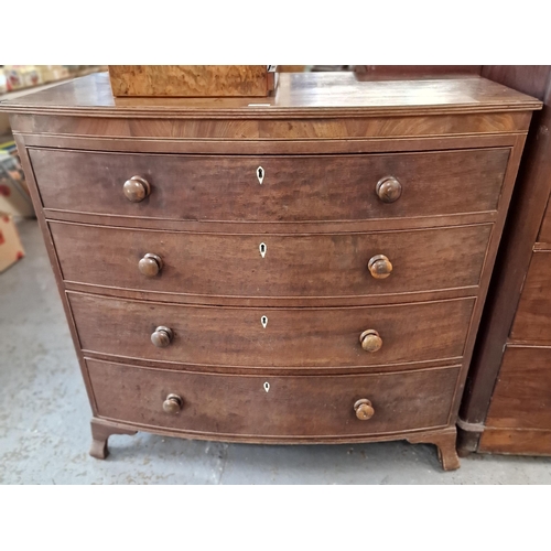 464 - 19th century mahogany bow front chest of four long long drawers on bracket feet. 102x55x93cm approx.... 